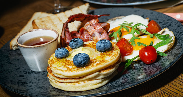 With plans for steady expansion across Europe and beyond, Norrein Group remains a market leader by combining guest-driven insights with cutting-edge innovation Fried breakfast with pancakes & blueberries